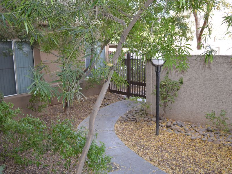 Gated walkway entrance at a Biltmore Square building
