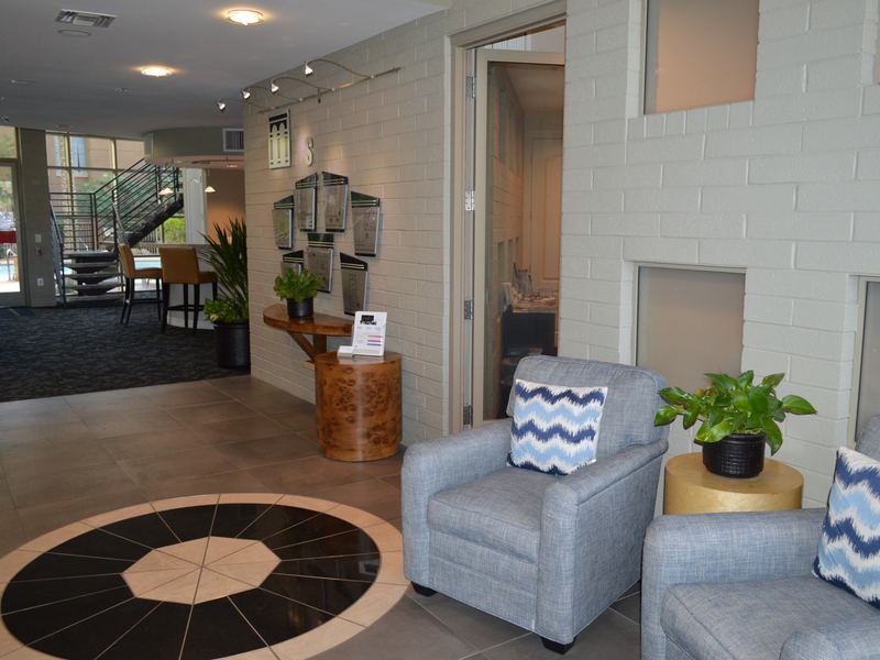 Lobby area with floor plan displays